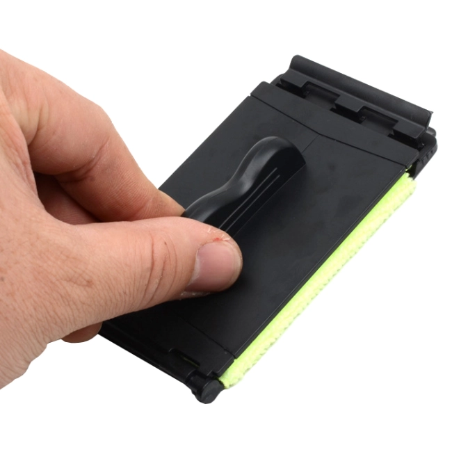 пристрій для очищення струн гітари