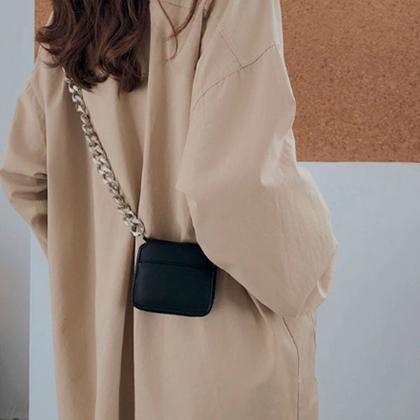 жіноча сумочка-гаманець через плече