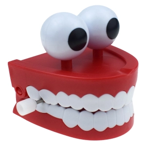 заводная игрушка зубы с глазами