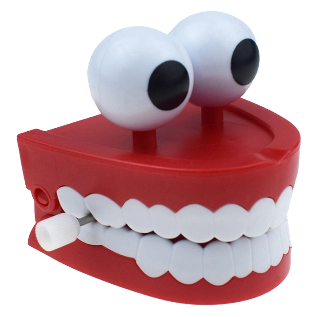 заводная игрушка зубы с глазами