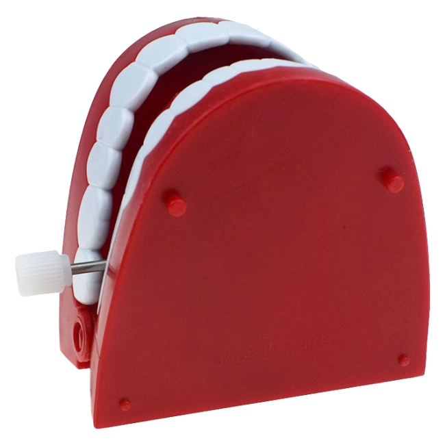 заводная игрушка в виде зубов с глазами