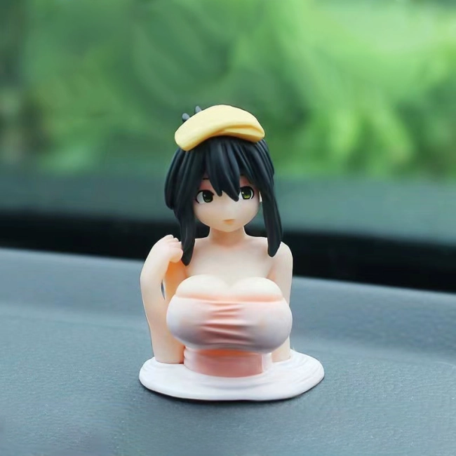 фигурка в виде девушки для машины