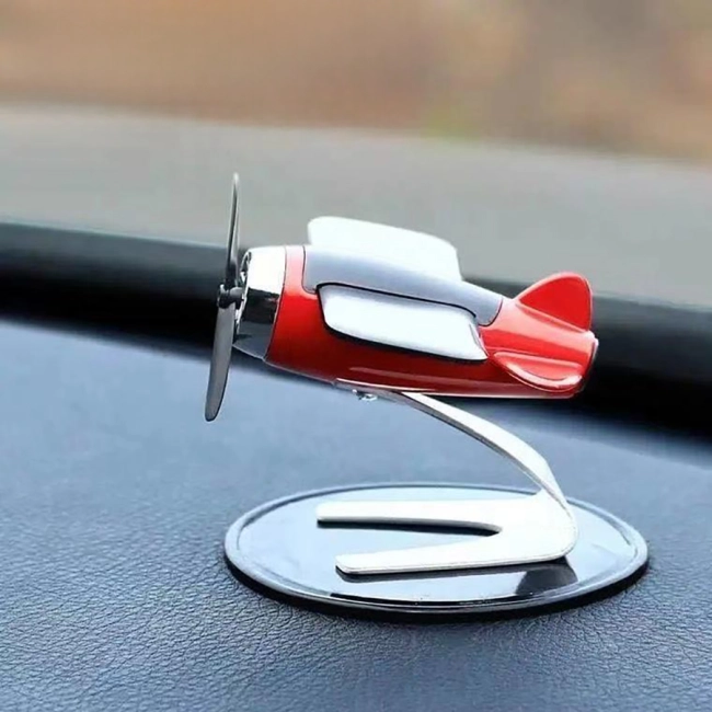 фігурка літачка в машину