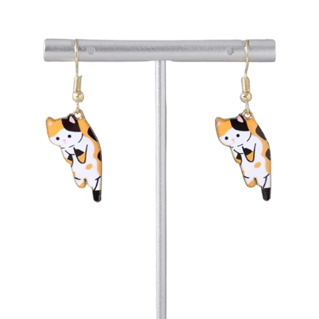 сережки коти