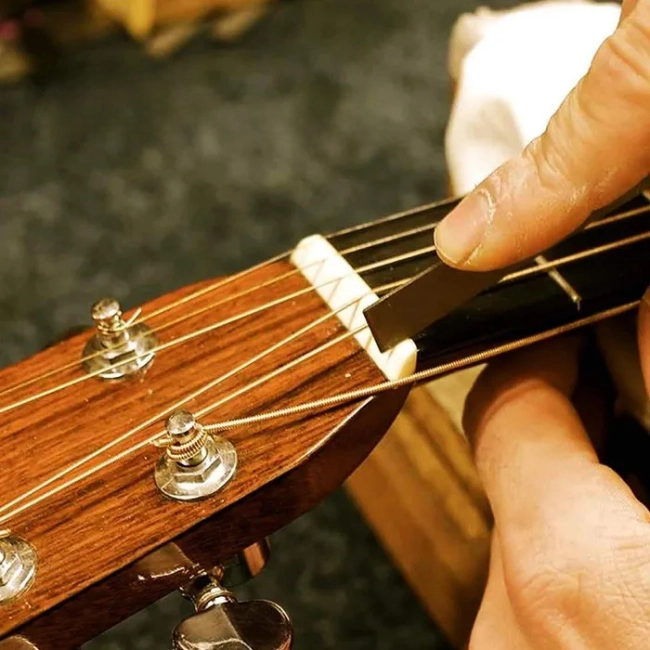 набір для догляду за гітарою