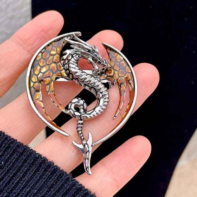 брошка дракон