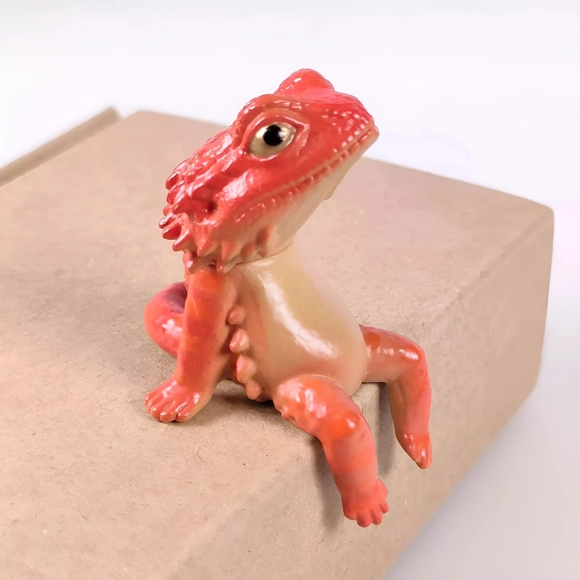 статуетка ящірки