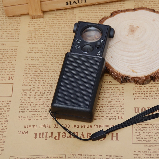 складна лупа з підсвічуванням