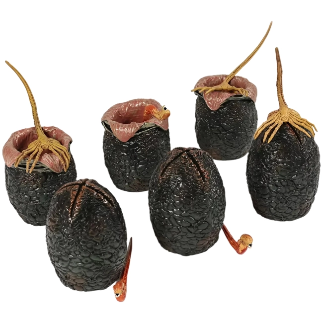 фігурки з яйцями чужих