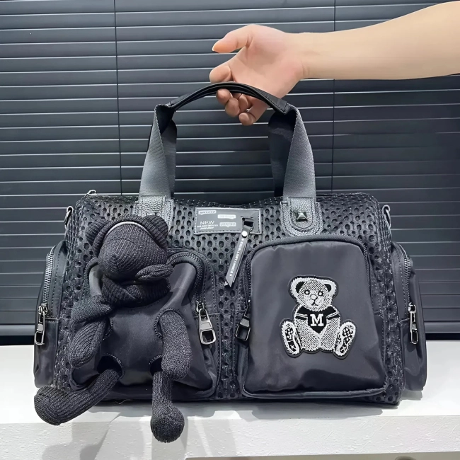 дорожня сумка з довгою ручкою