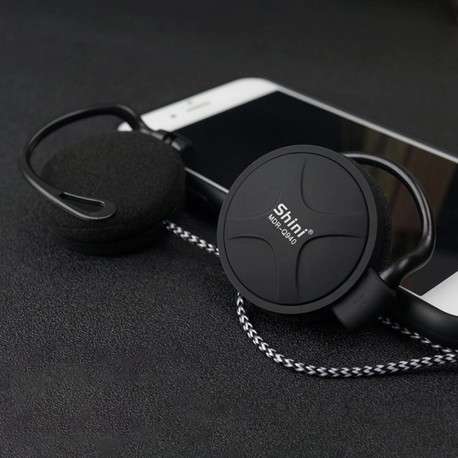 навушники які чіпляються за вухо