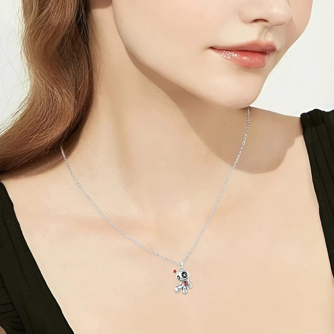 кулон в виде куклы вуду