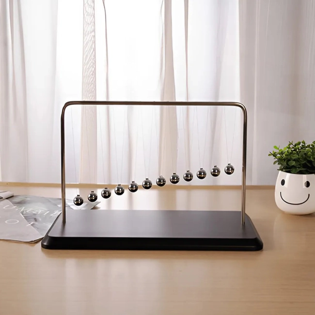 маятник с 12 шариками