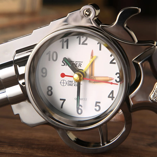 часы с револьвером