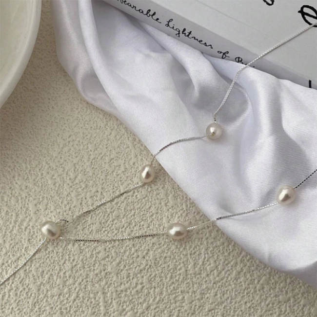 ожерелье с жемчужными бусинами