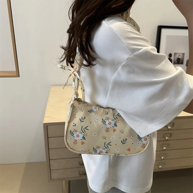 жіноча сумка з квітковим принтом