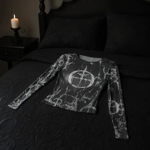 Напівпрозорий лонгслів з принтом лонгслів з принтом