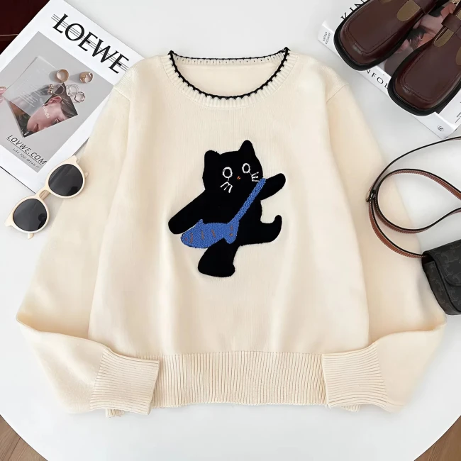 женский свитер с принтом