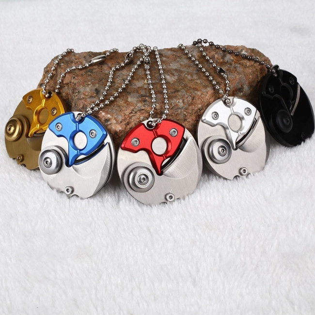 Брелок монета з прихованим ножем