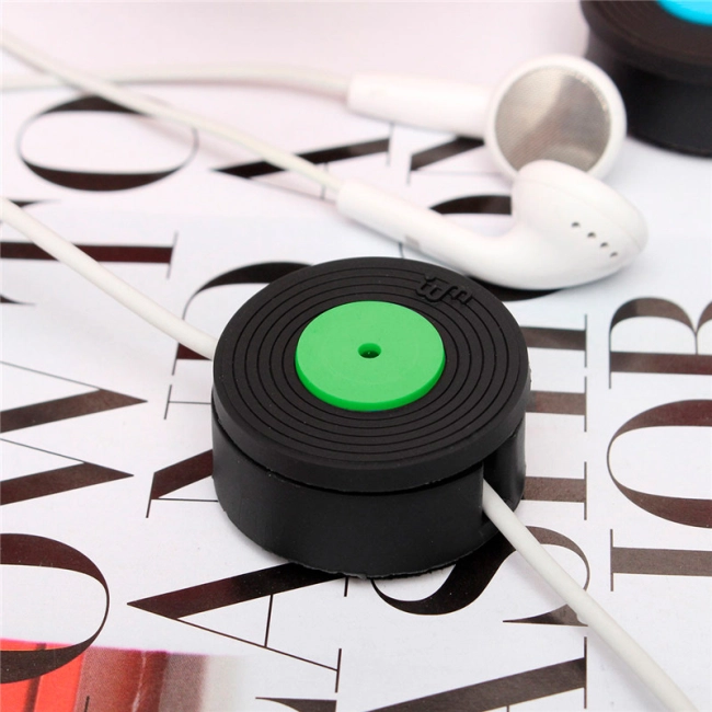 приспособление для сматывания наушников