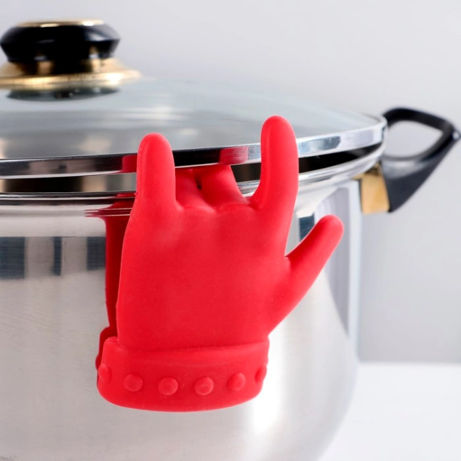 тримач ложки рука