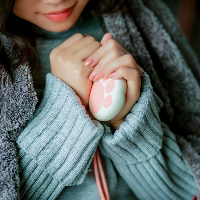 грілка ручна у вигляді лапки