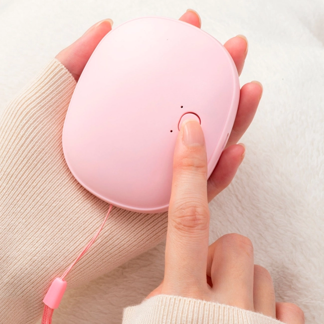 електрична кишенькова грілка