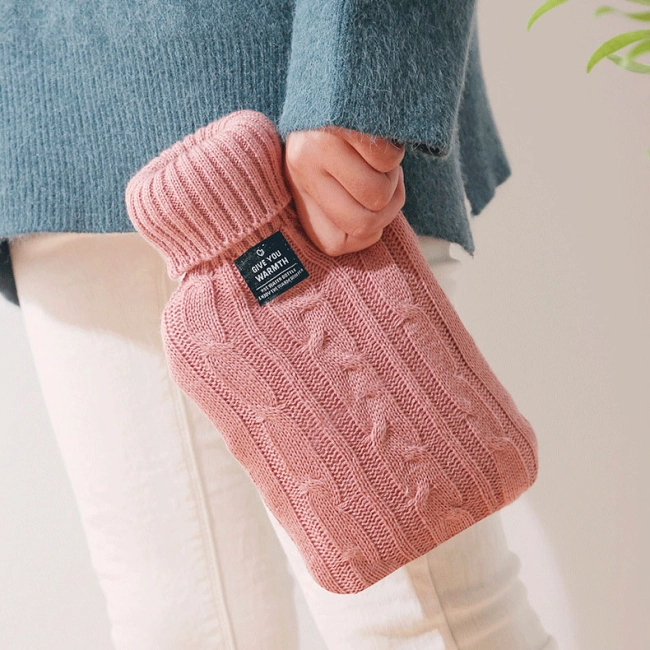 грілка у светрі