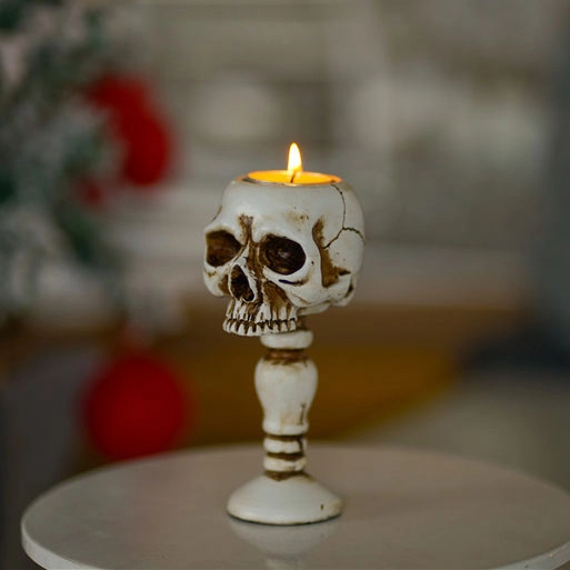 підставка під свічки у формі черепа