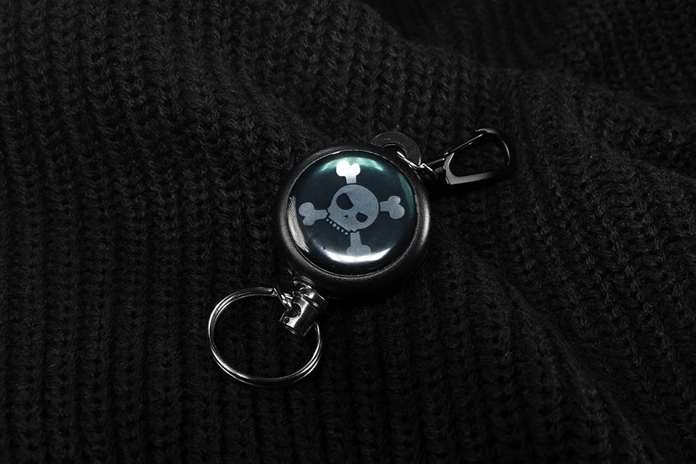 Ретрактор с черепом