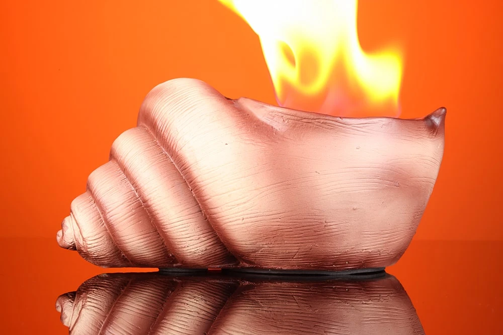 Переносний міні-камін у вигляді мушлі