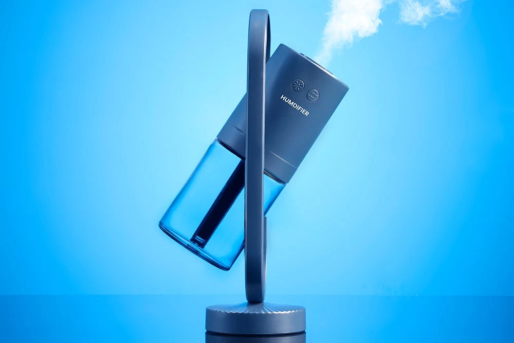 Зволожувач повітря, що обертається, з проектором